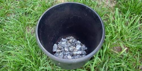 gravel on the bottom of the pot