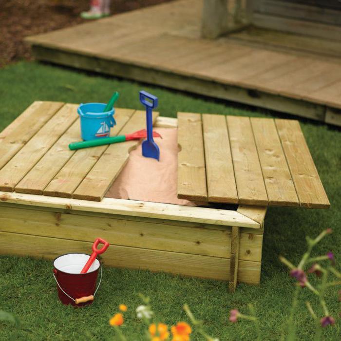 sandbox with a lid bench with your own hands photo