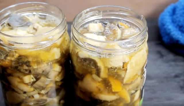 Brown mushrooms marinated in jars for the winter